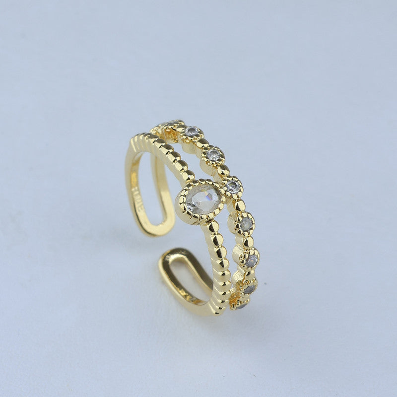 ANILLO AJUSTABLE DOBLE CON SOLITARIO Y CANOTILLO 7010933