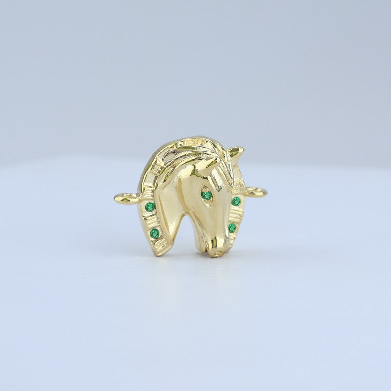 SEPARADOR HERRADURA CABALLO CON ESMERALDAS 22*17MM 714083