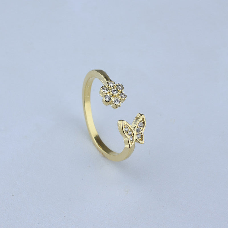 ANILLO AJUSTABLE CON FLOR Y MARIPOSA DE ZIRCONES 701075