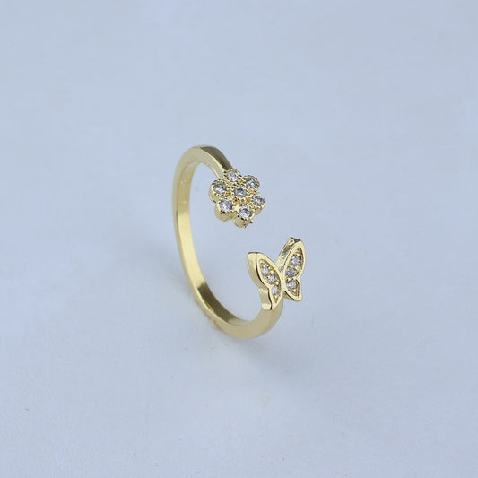 ANILLO AJUSTABLE CON FLOR Y MARIPOSA DE ZIRCONES 701075