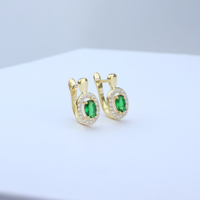 CANDONGA HALO OVALADA 9*16MM CON PIEDRA ESMERALDA CENTRA 705281